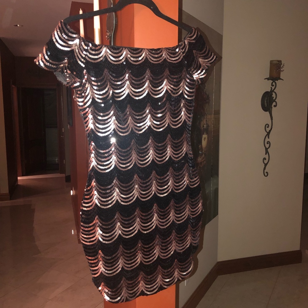 Gold and black sequin dress